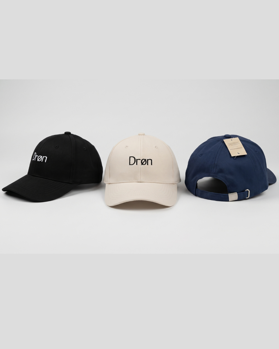 The Drøn Intent Cap in Black, Navy and Stone colors