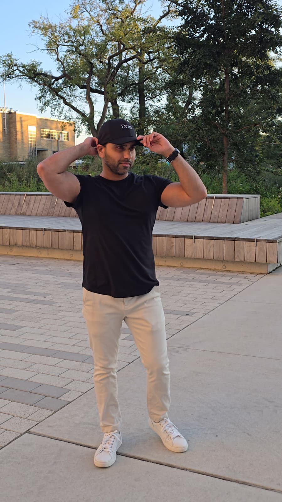 Man wearing the Drøn Intent Tee and Intent Cap Black