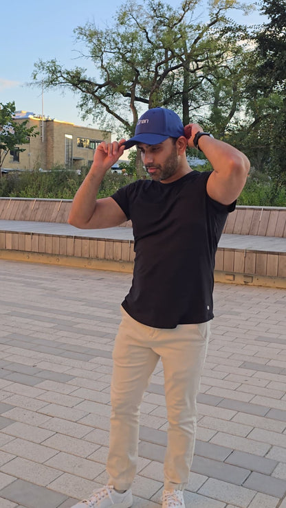 Man wearing the Drøn Intent Tee and Intent Cap Navy