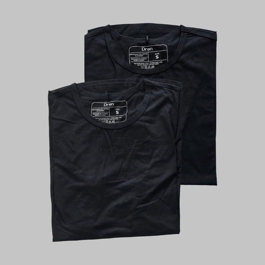 Drøn Intent Tee 2-Pack — two premium bamboo-cotton men's t-shirts in black, folded on white background